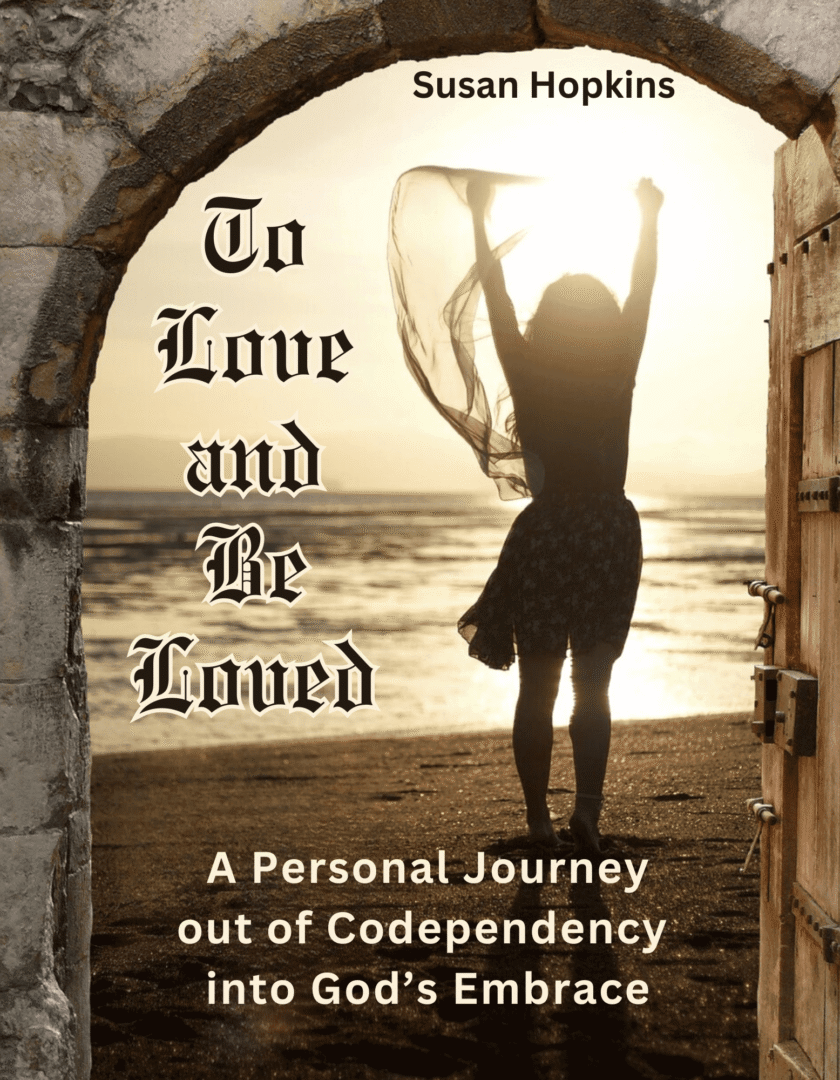 Silhouette of a woman joyfully dancing in a rustic doorway.