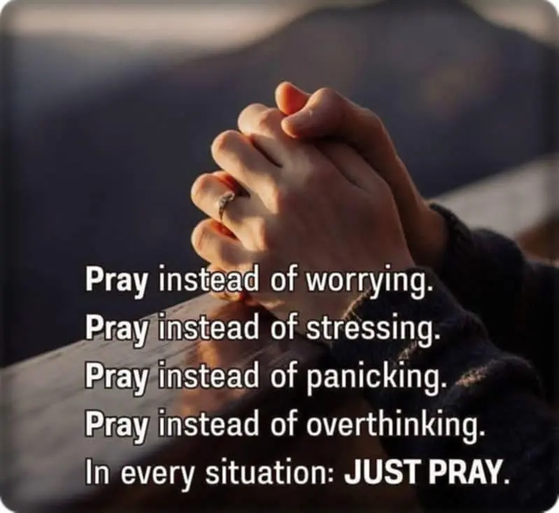Hands clasped in prayer with motivational text.
